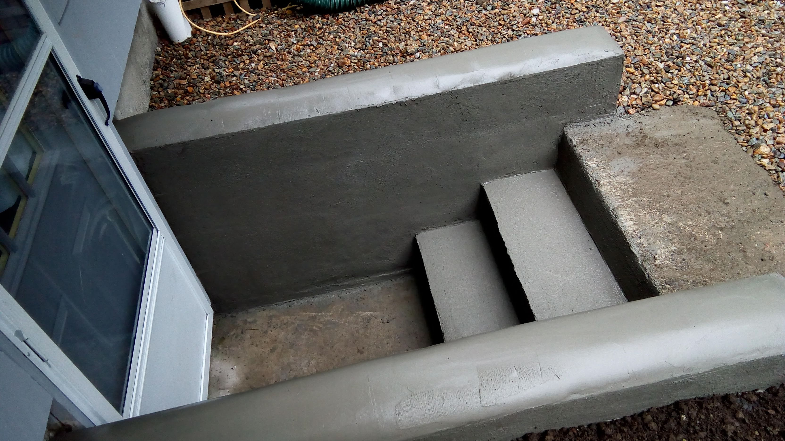 New basement steps rebuilt with proper drainage in Easton, MA — Mass Patio & Masonry