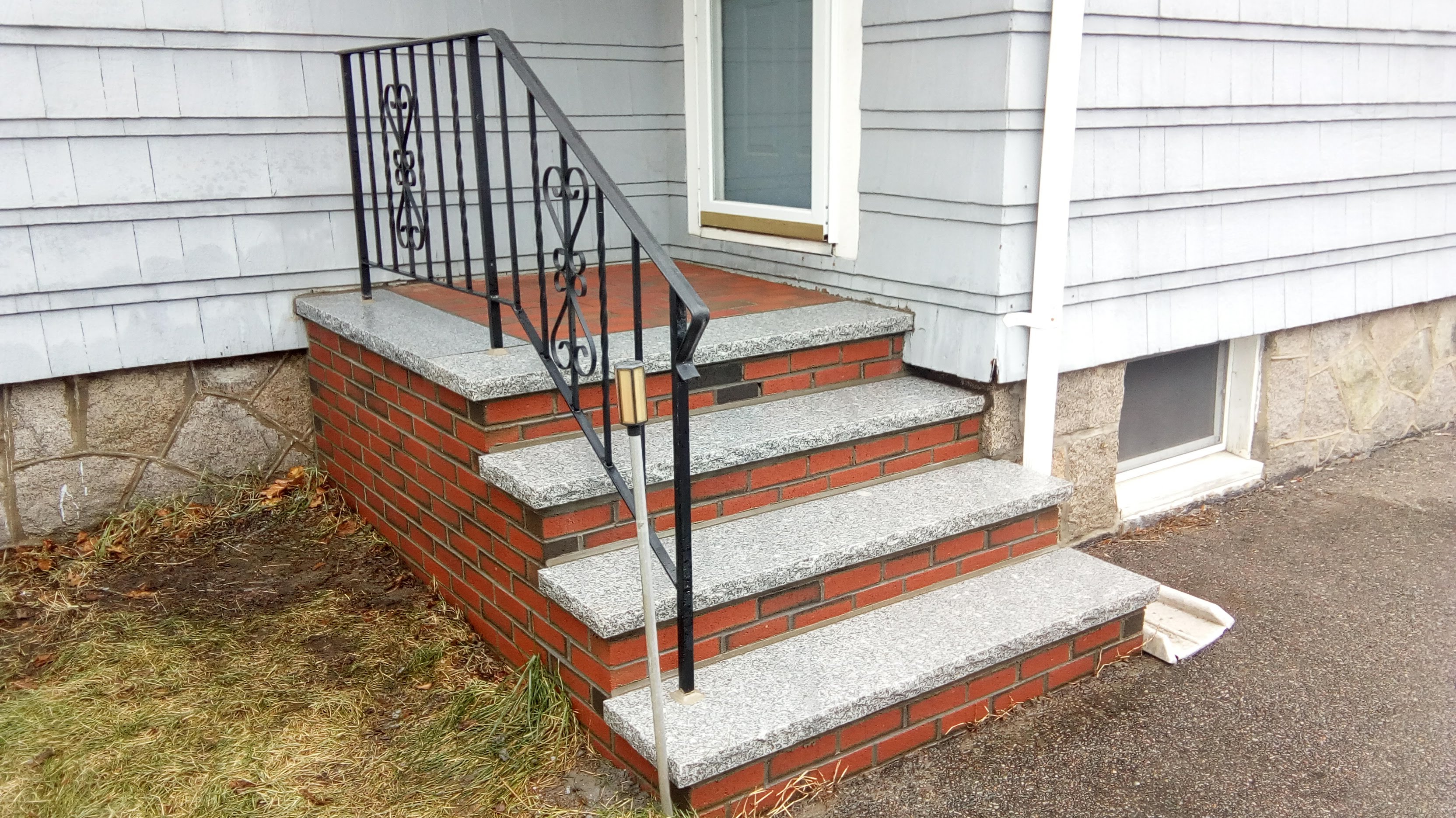 Granite re-tread step repair replacing cracked bluestone at a Stoughton, MA home — Mass Patio & Masonry